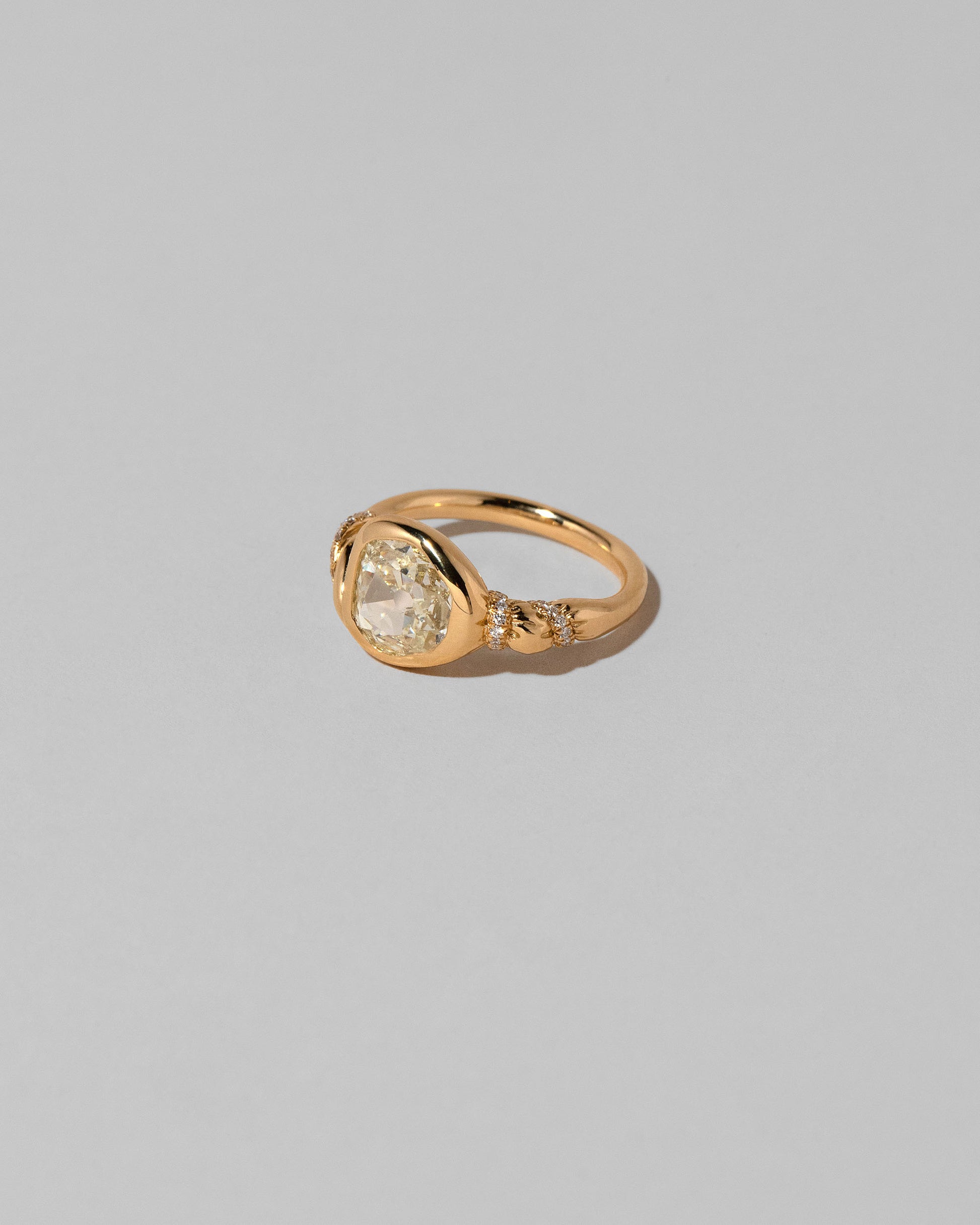 View from the side of the Coil Ring on light color background.