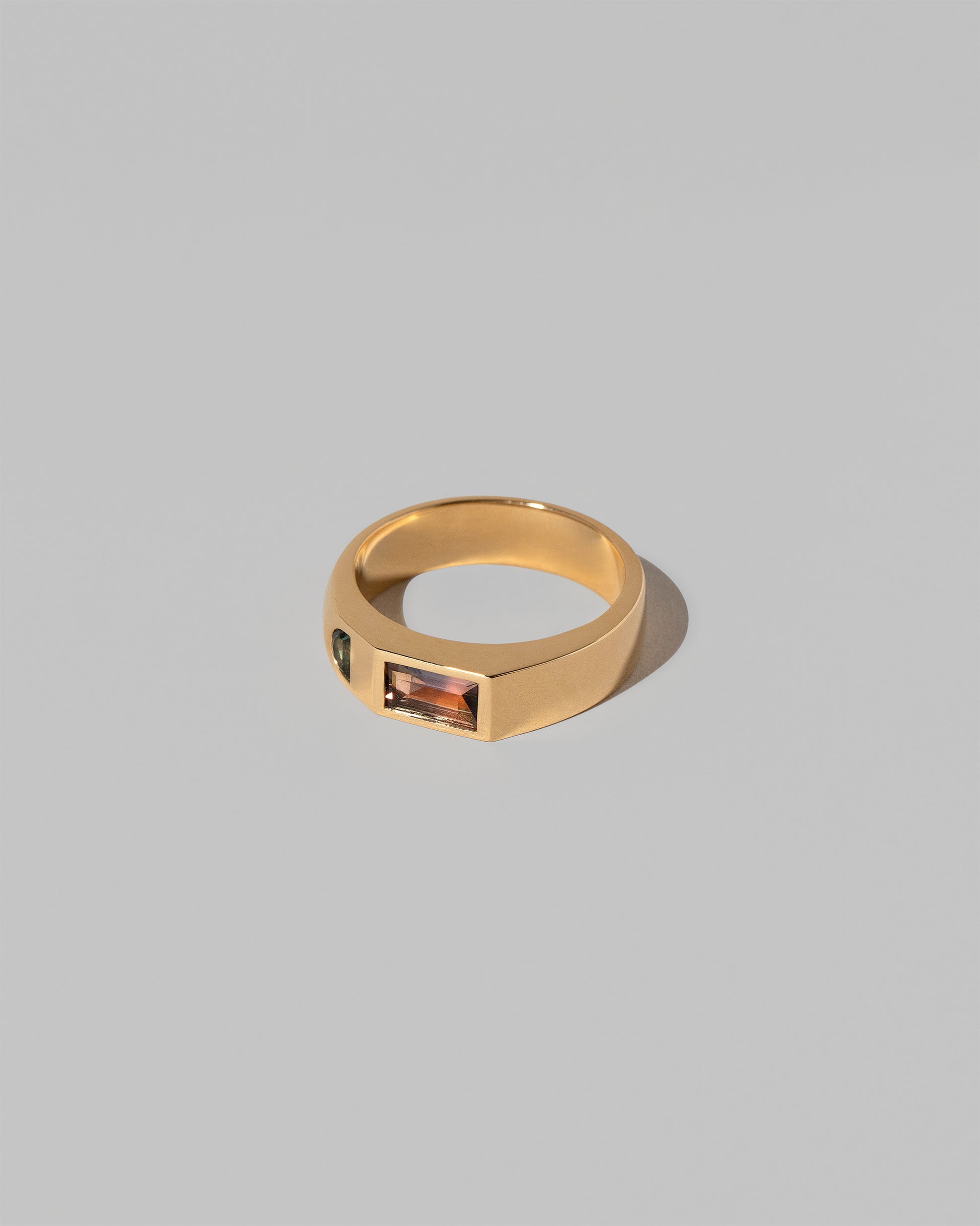 View from the side of the Entity Ring on light color background.