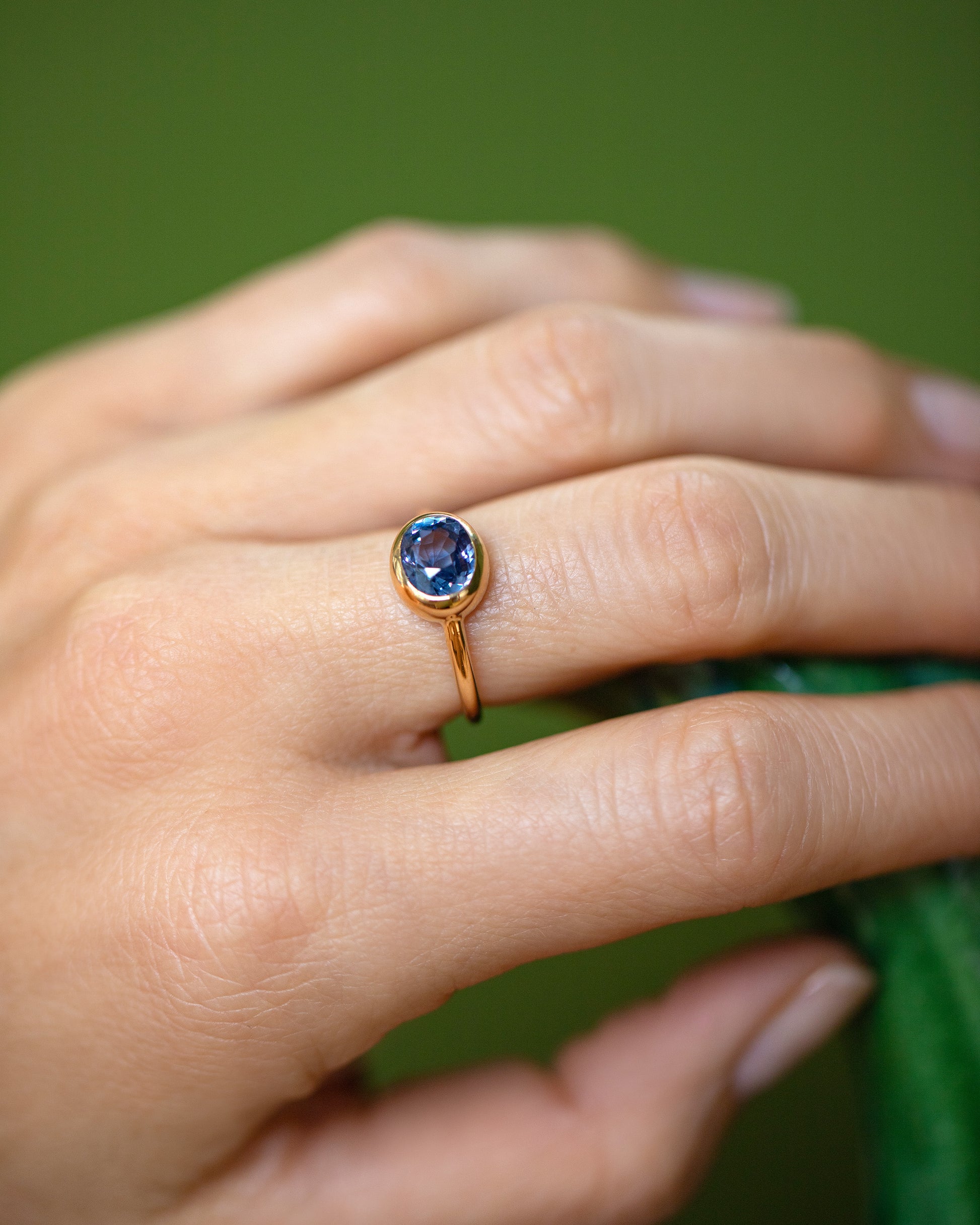 Geyser Blue Sapphire Ring 002 on model.