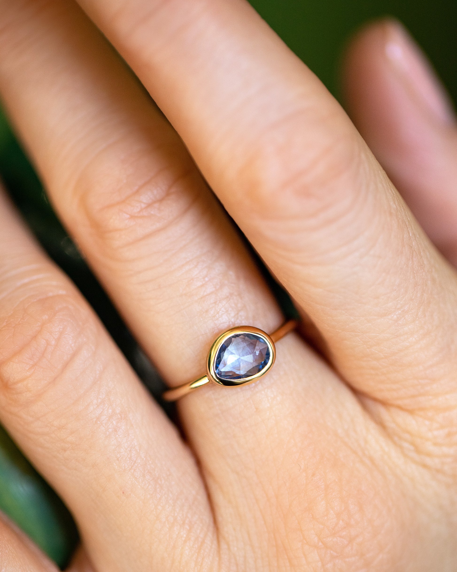 Gusher Blue Sapphire Ring 023 on model.