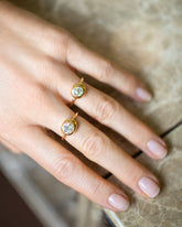 Diamond Grand Level Ring and Diamond Level Ring on model.