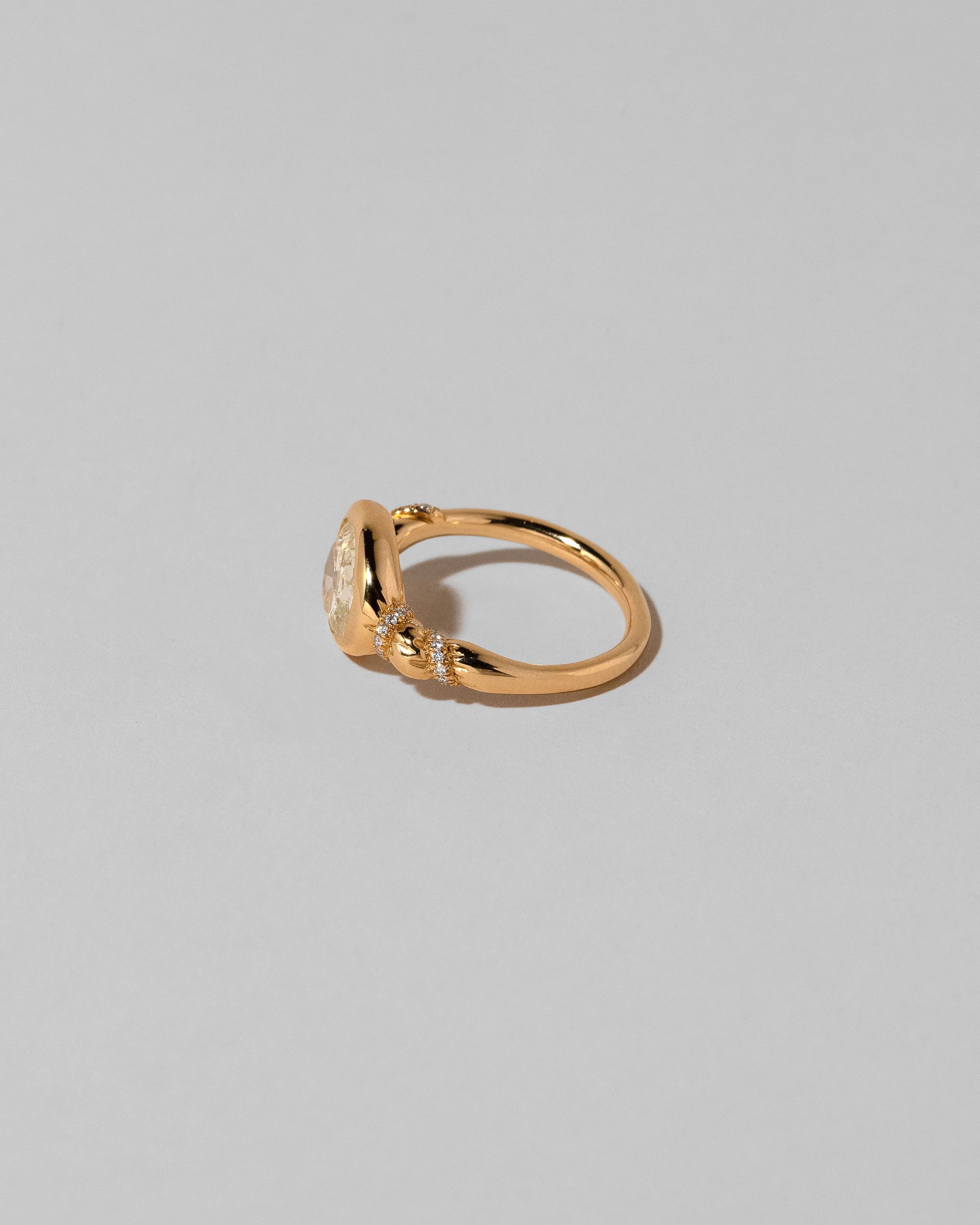 View from the back of the Twist Ring on light color background.