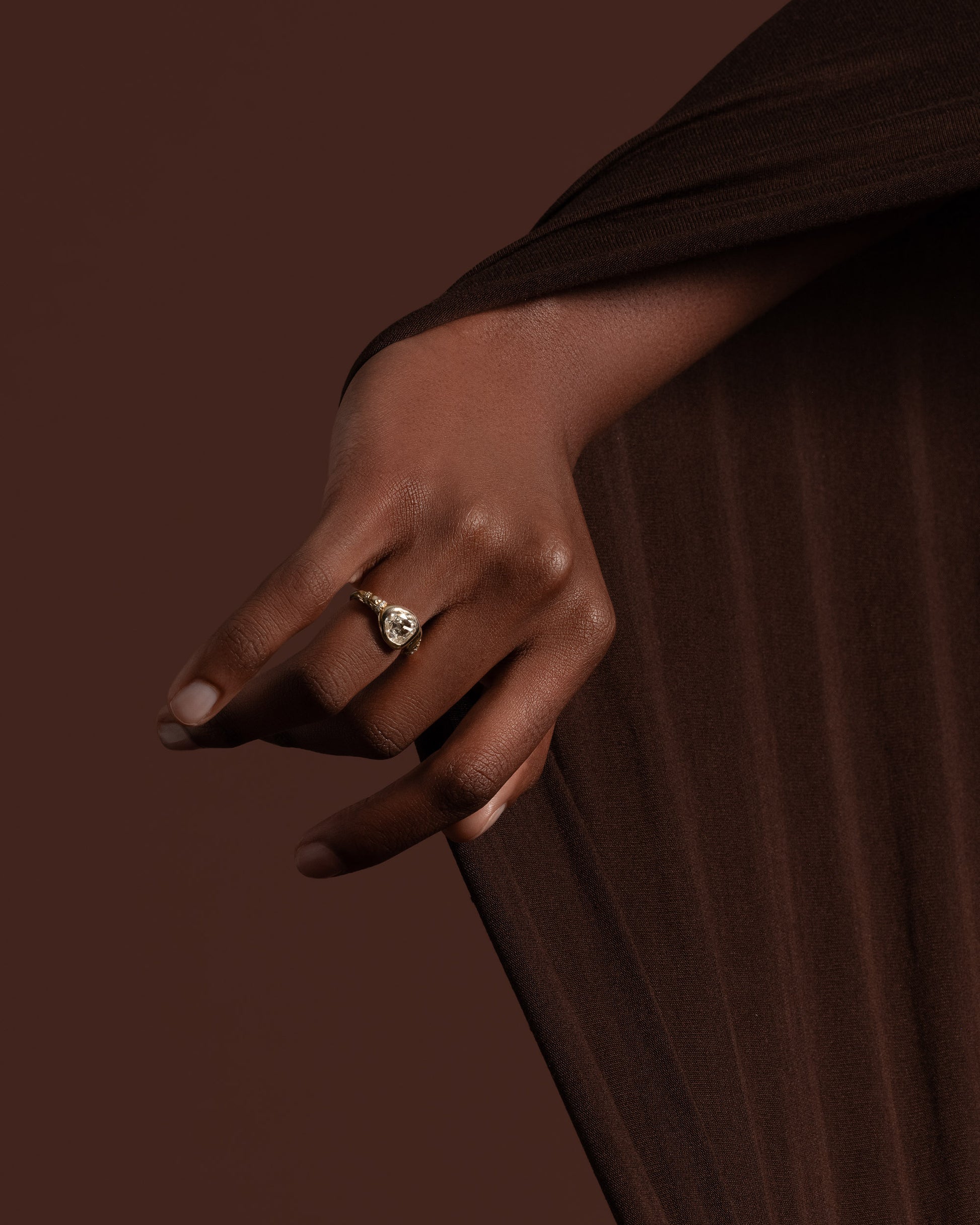 Styled image featuring the Coil Ring.