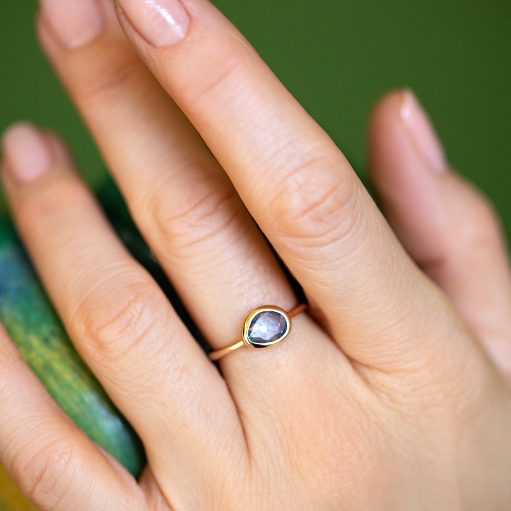product_details::Gusher Blue Sapphire Ring 023 on model.
