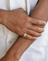 Gold Arcade Rings on male model.