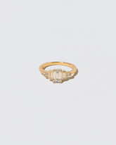 Diamond Assertion Ring on light color background.