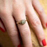 product_details::Champagne Diamond Grand Level Ring on model.