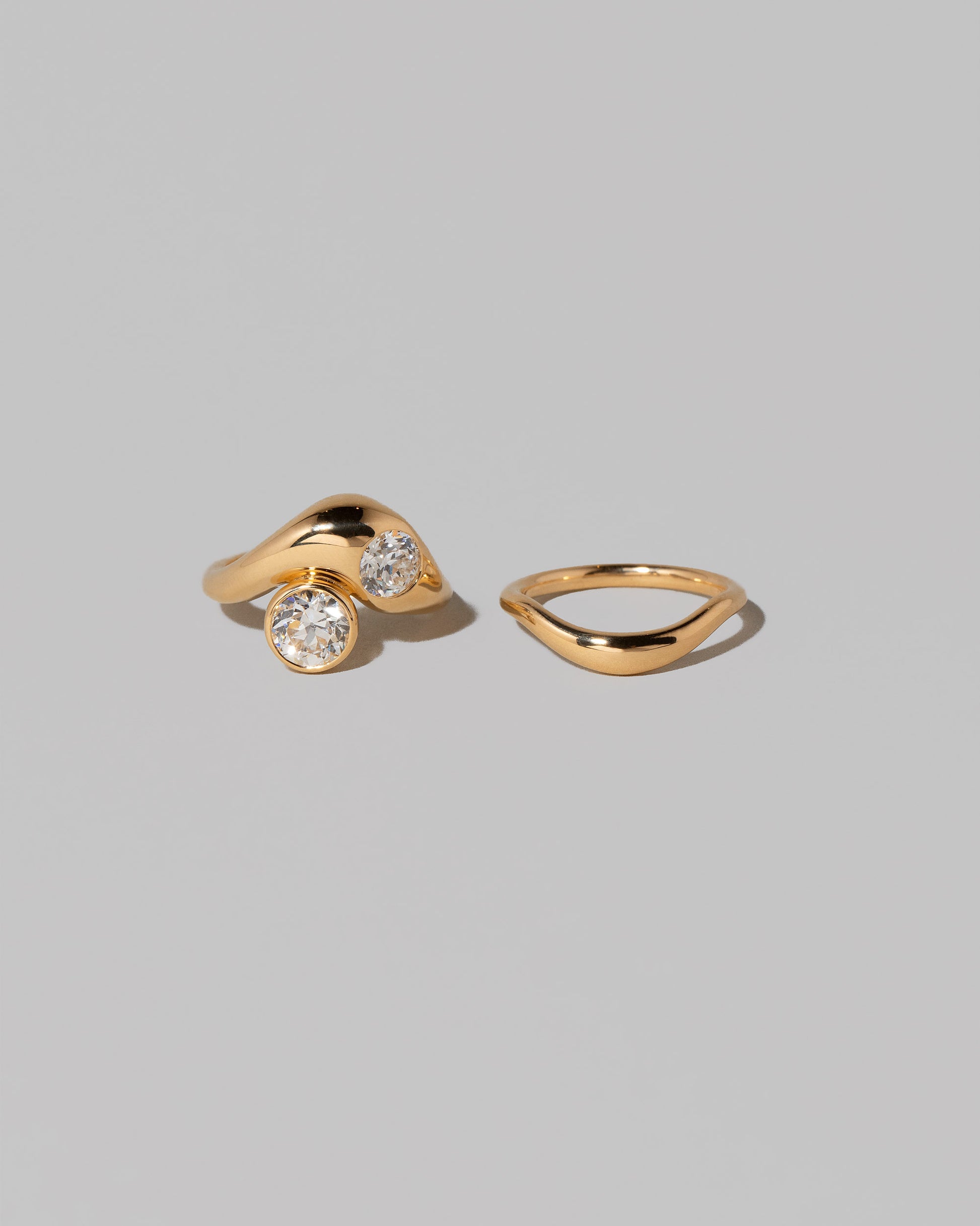 Detail view of the Diamond Two Ring on light color background.