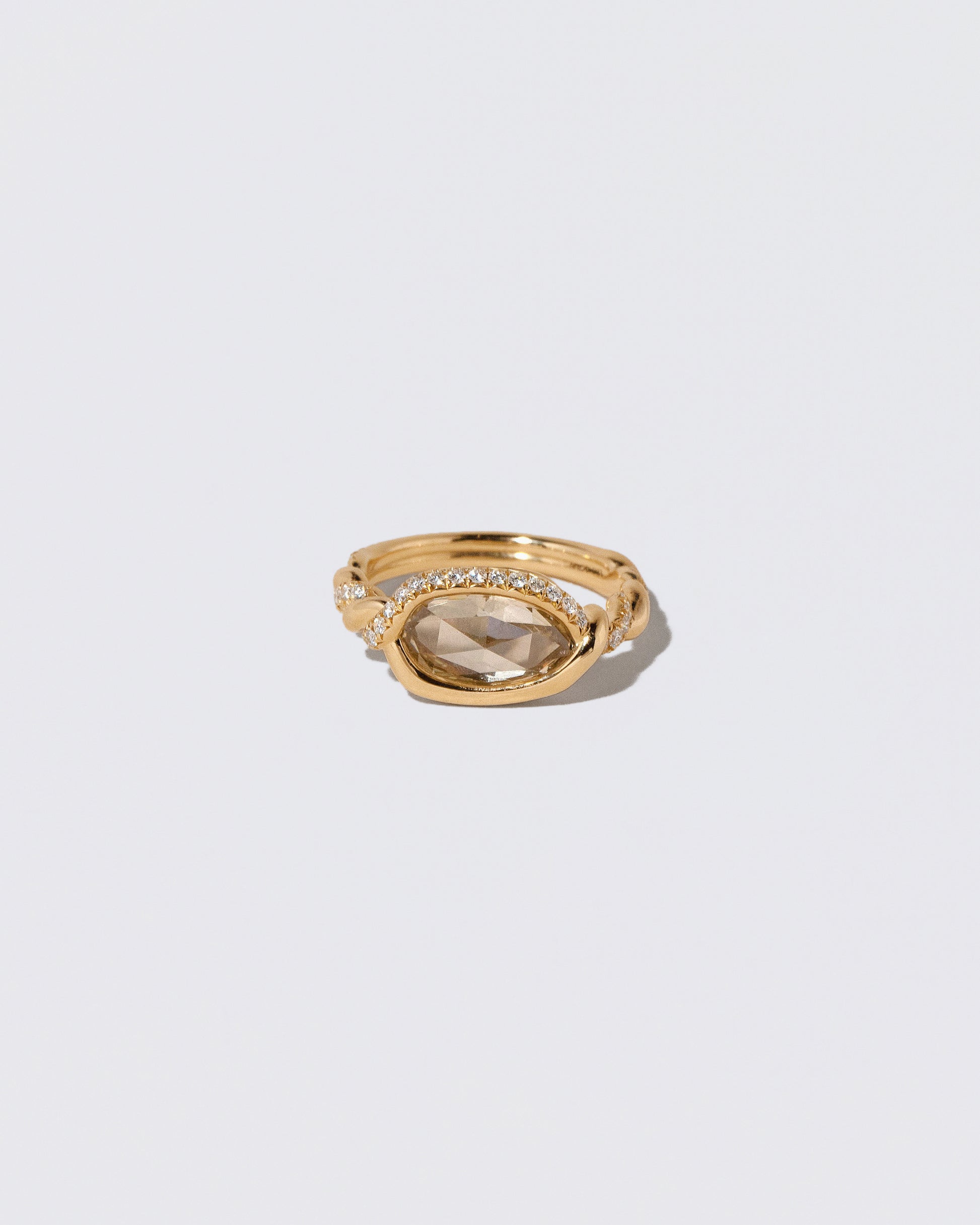 Encircle Ring on light color background.