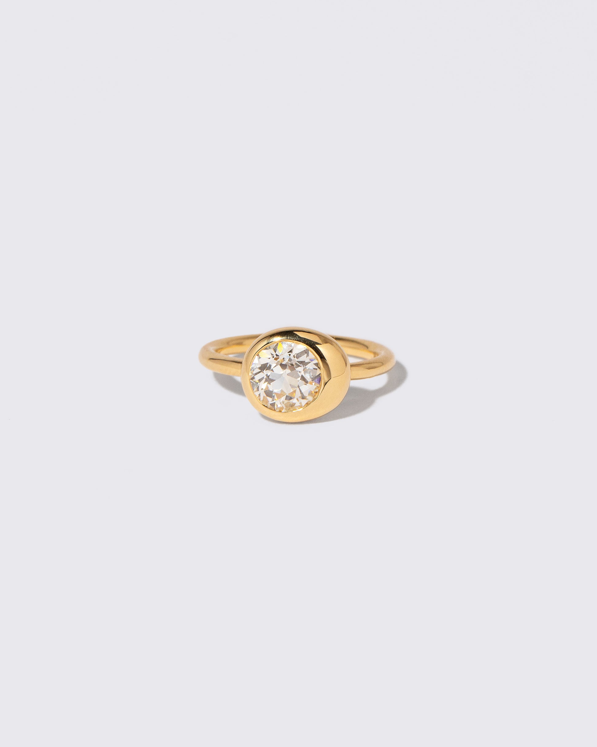 Diamond Grand Level Ring on light color background.