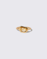 Yellow Sapphire Gusher Ring on light color background.