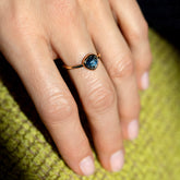 product_details::Gusher Blue Sapphire Ring 005 on model.