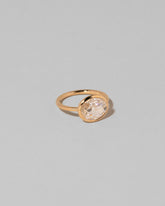 View from the side of the Gusher Diamond Ring 001 on light color background.