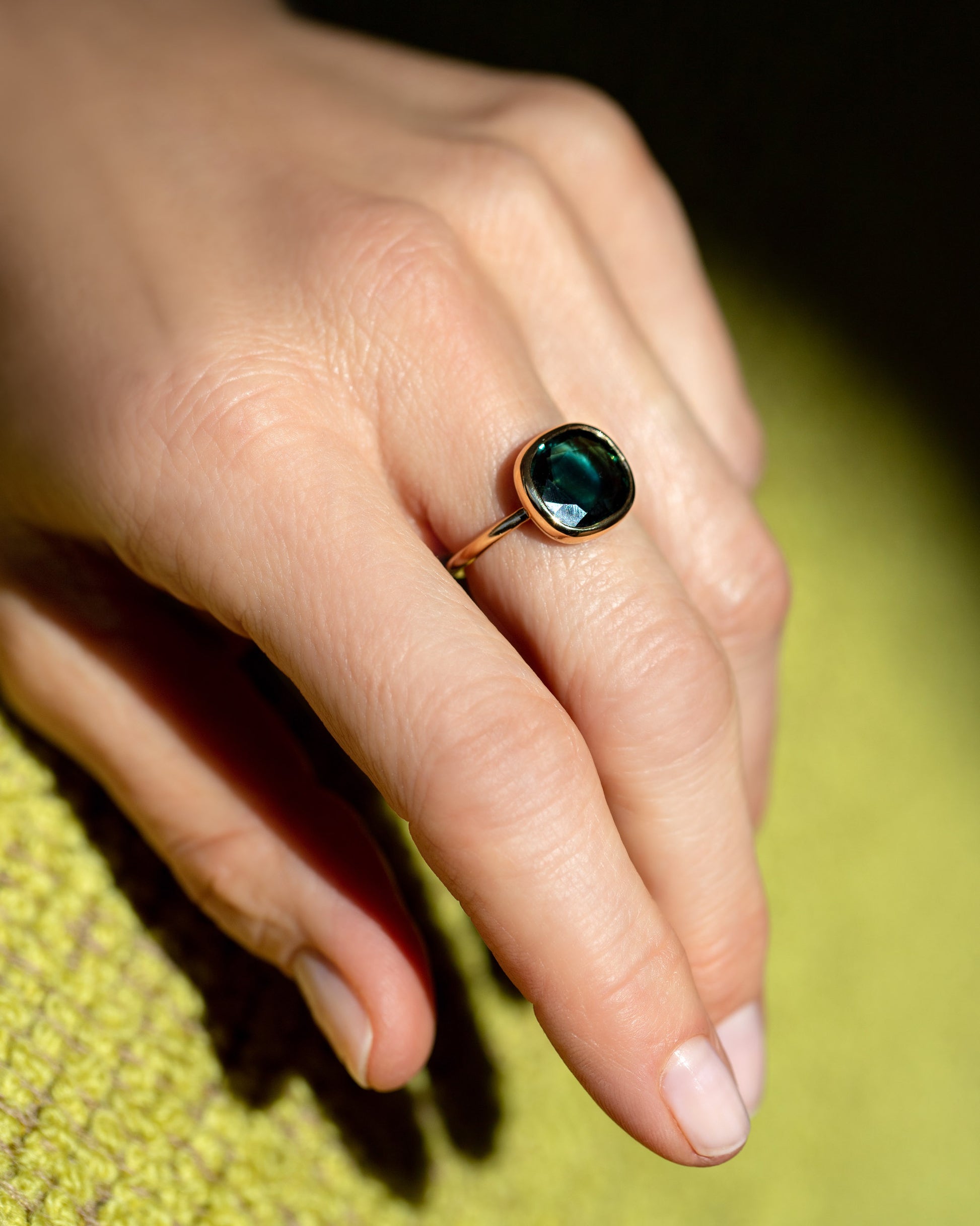 Gusher Bicolor Sapphire Ring 012 on model.
