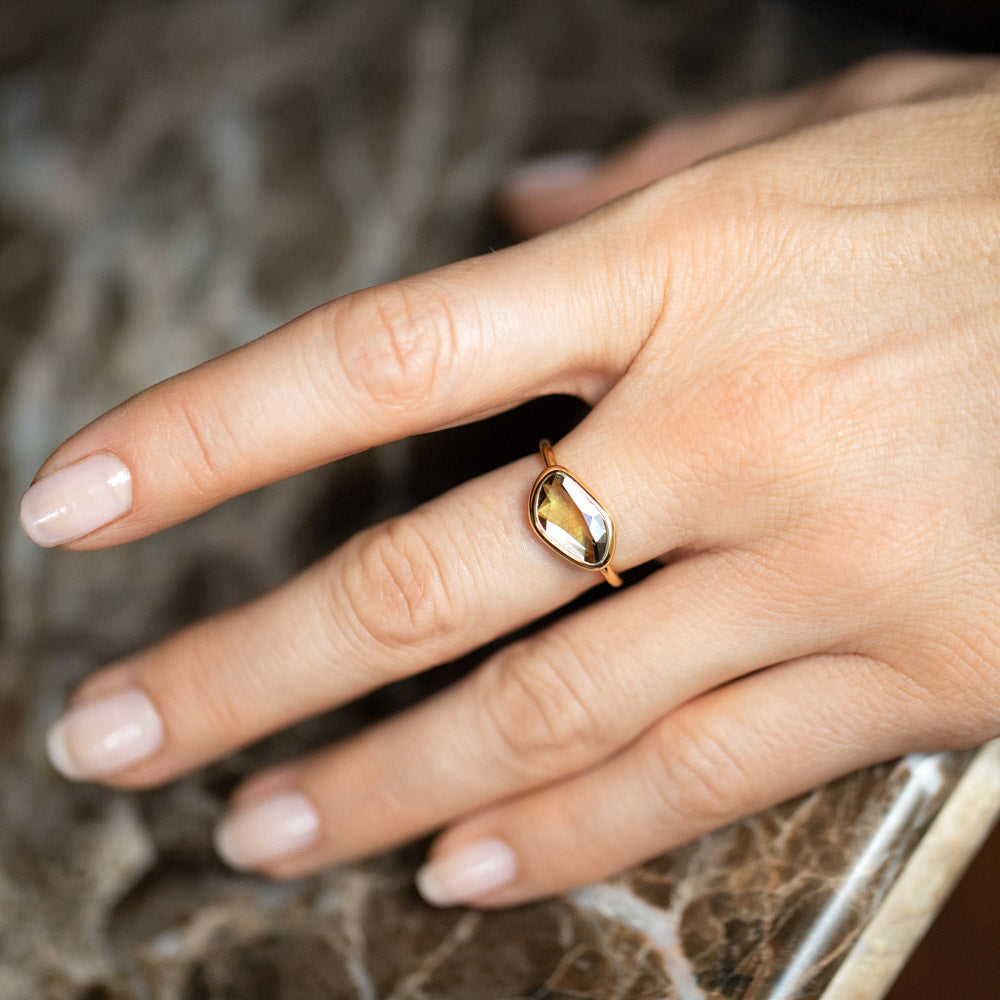 product_details::Gusher Green/Yellow Sapphire Ring 034 on model.