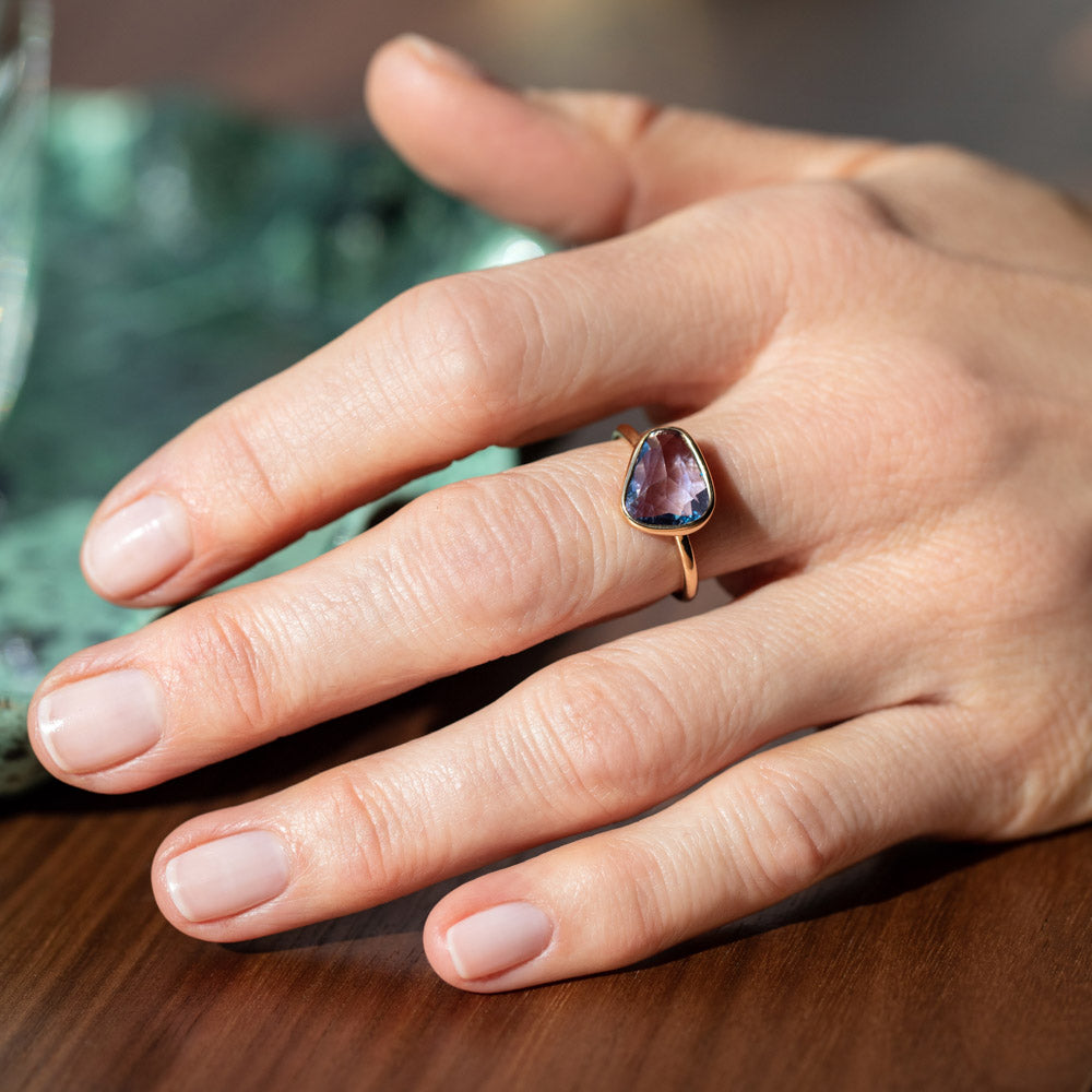 product_details::Gusher Purple Sapphire Ring 001 on model.