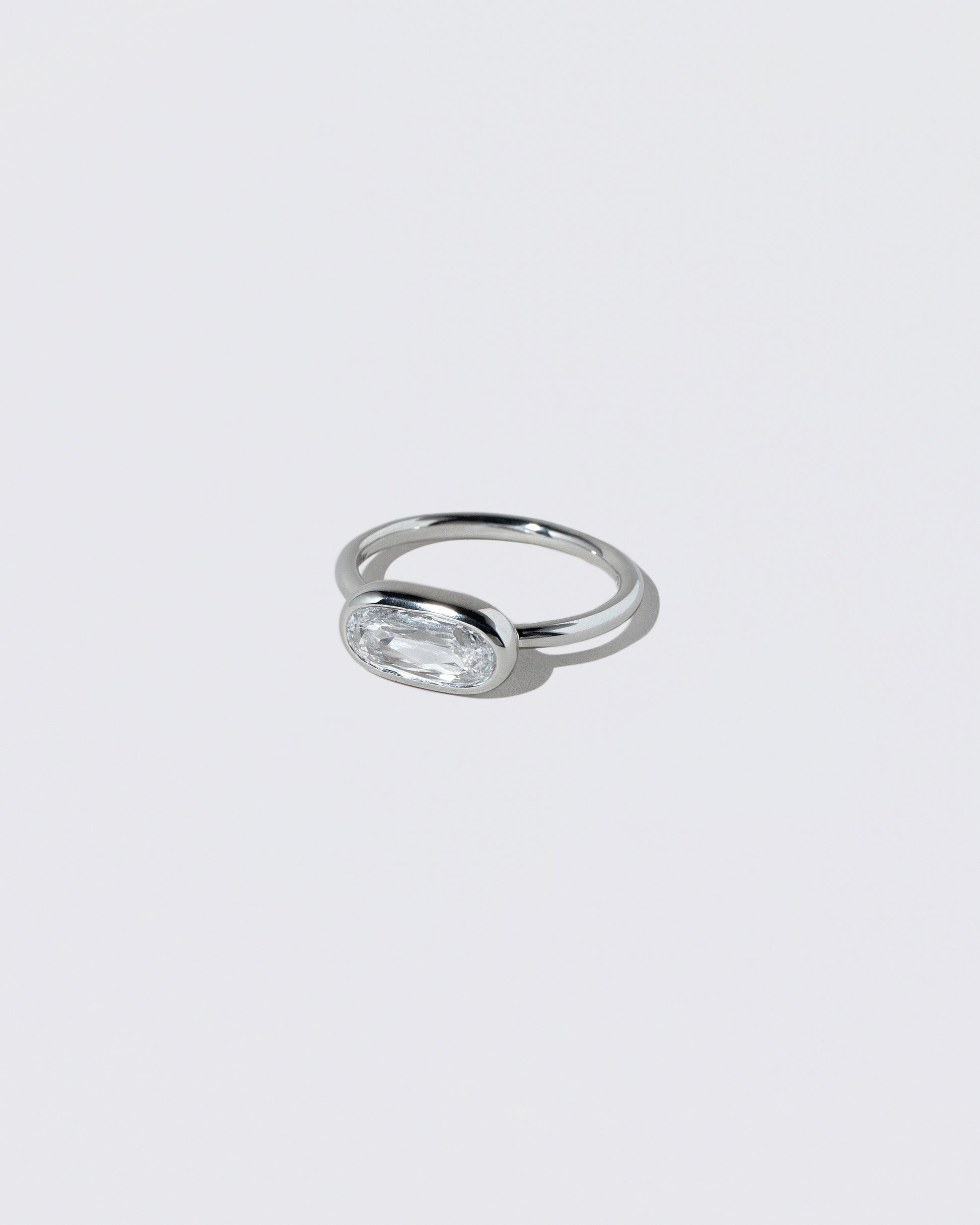 View from the side of the Gusher Diamond Ring 029 on light color background.