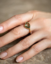 Gusher Green Sapphire Ring 036 on model.
