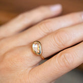 product_details::Gusher Teal Sapphire Ring 038 on model.