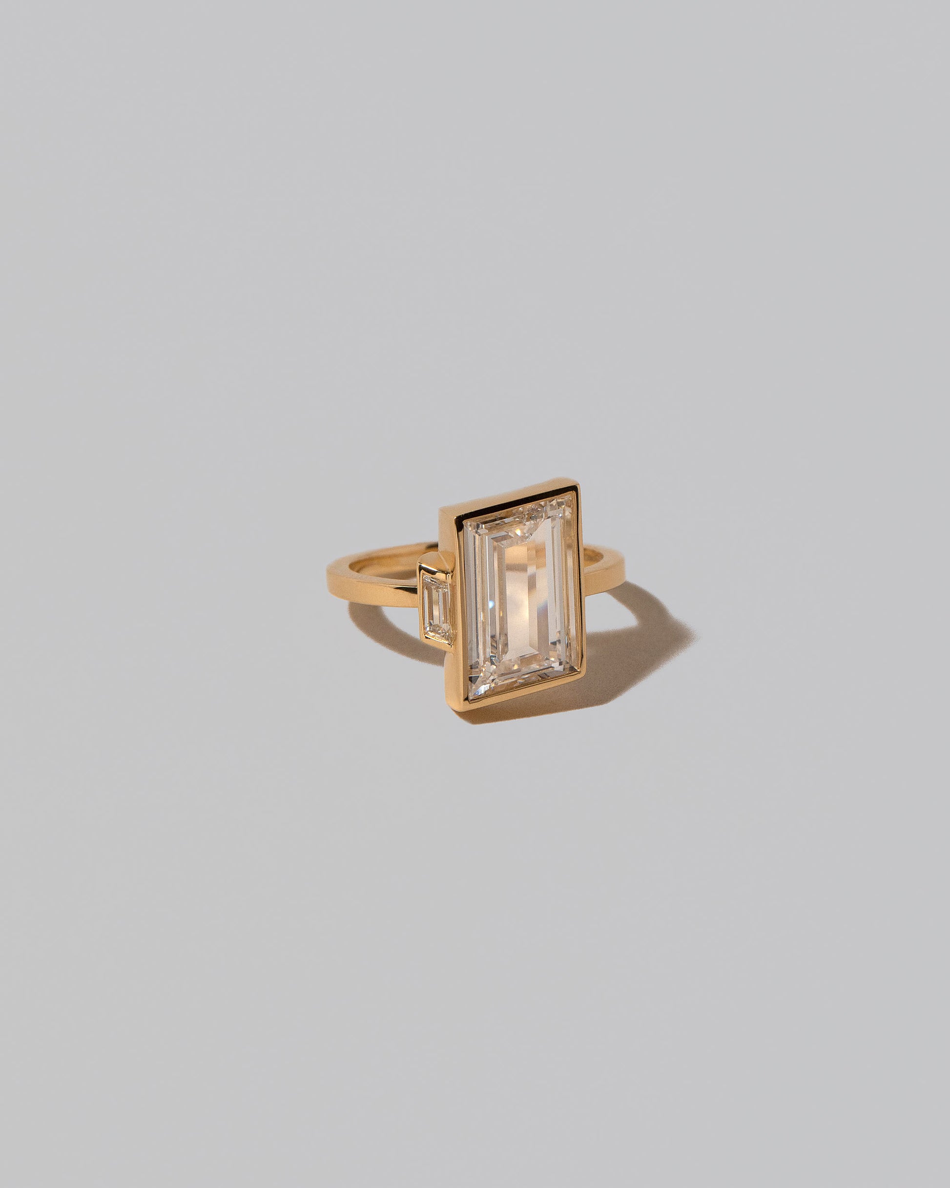 View from the side of the Laelia Ring on light color background.