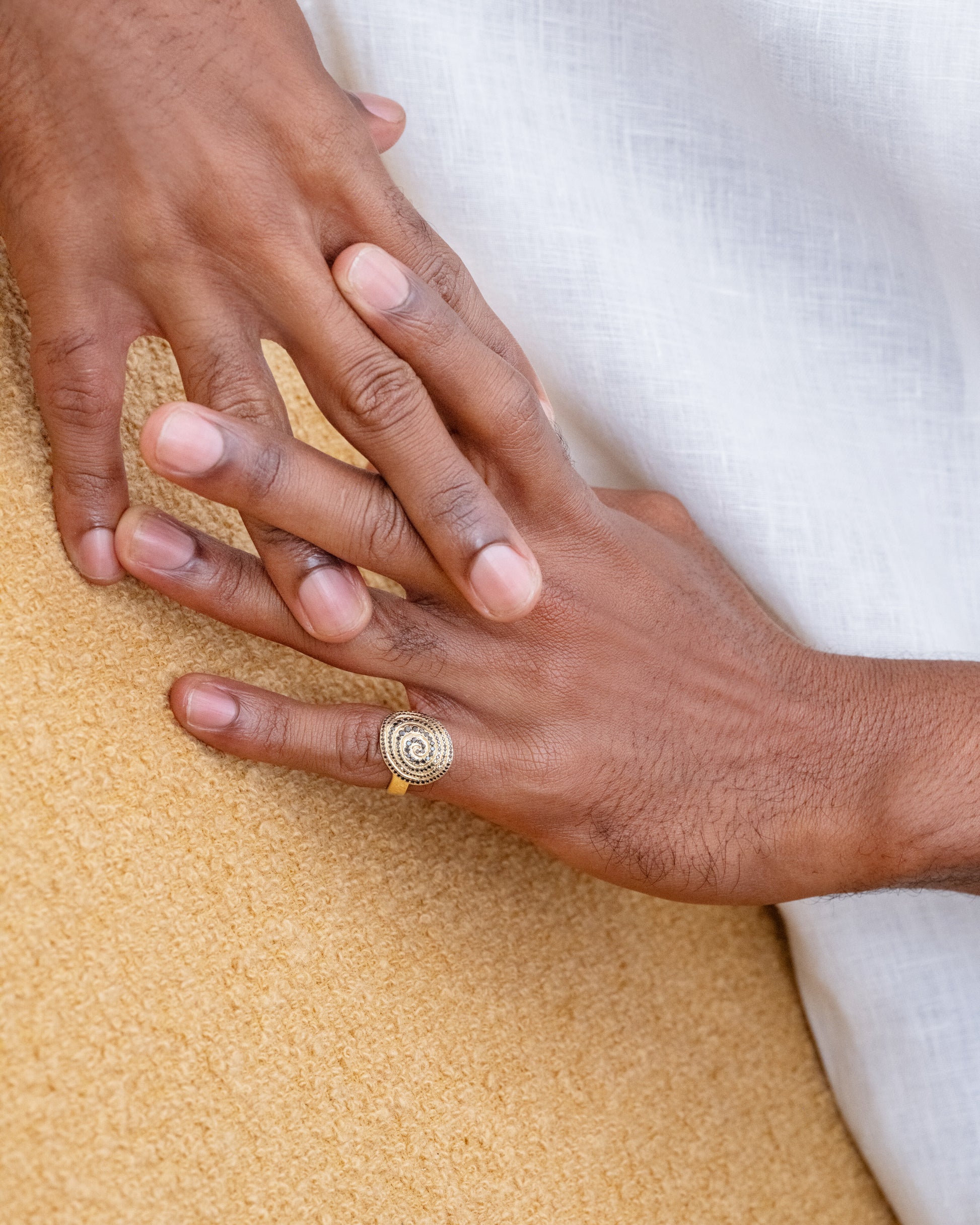 Black Diamond Lifecycle Ring and Hot Dog Chain Bracelets on male model.