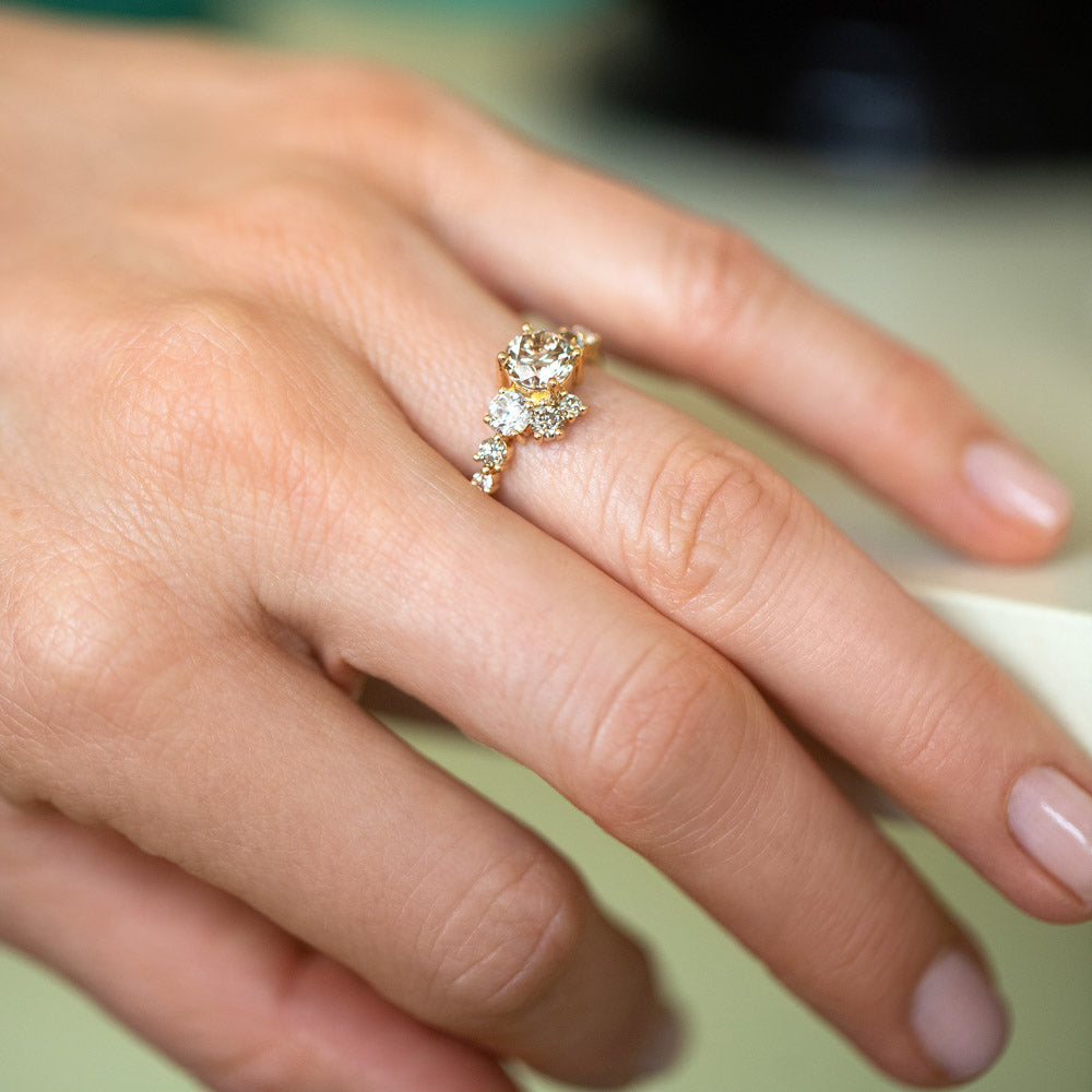 product_details::Champagne Diamond Luna Ring on model.