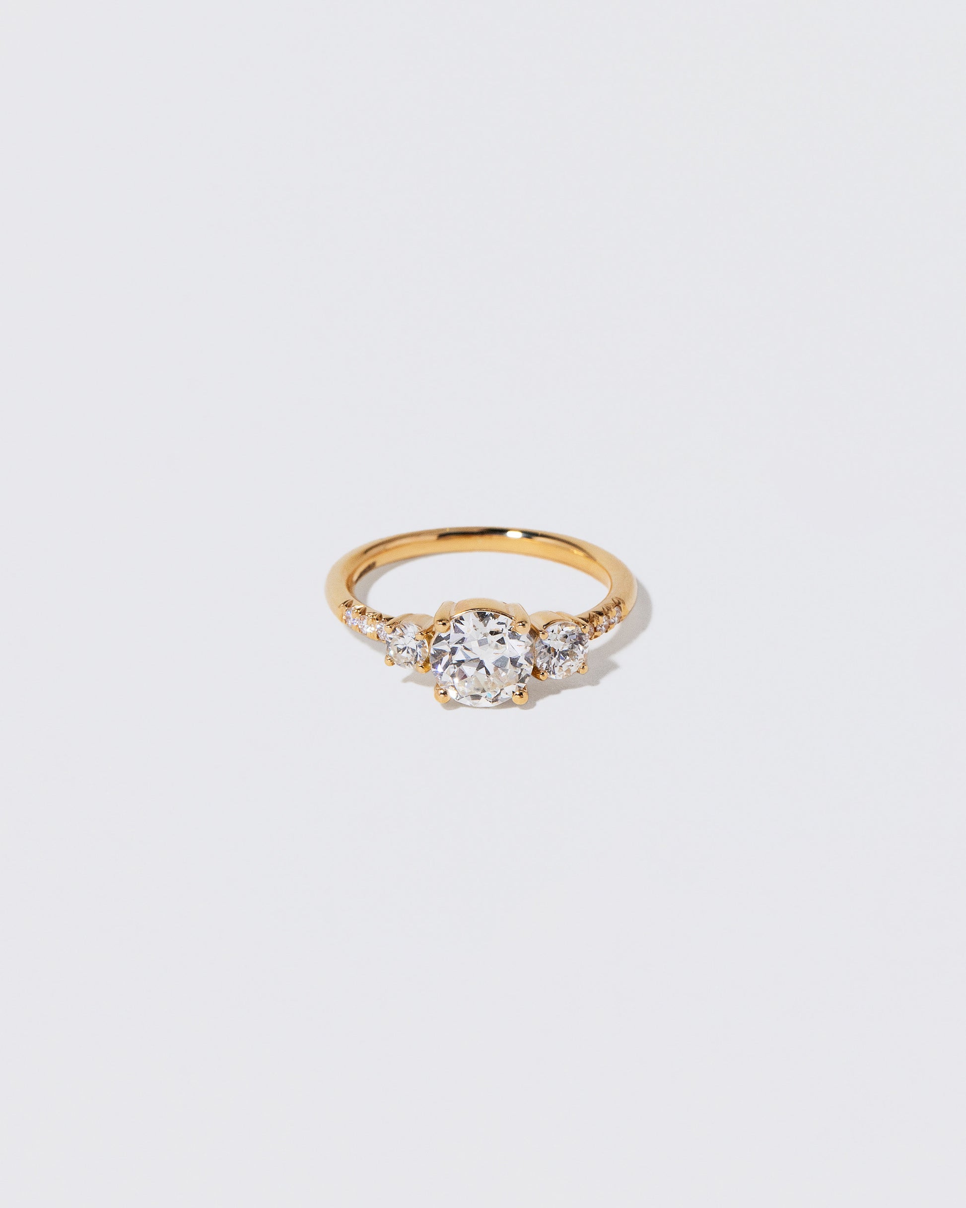 White Diamond Orion Ring on light color background.