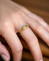 Oval Brown Diamond Transformation Ring on model.