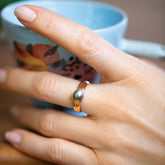 product_details::Scylla Ring on model.