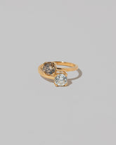 A past version of the Champagne & White Diamond Union Ring on light color background.