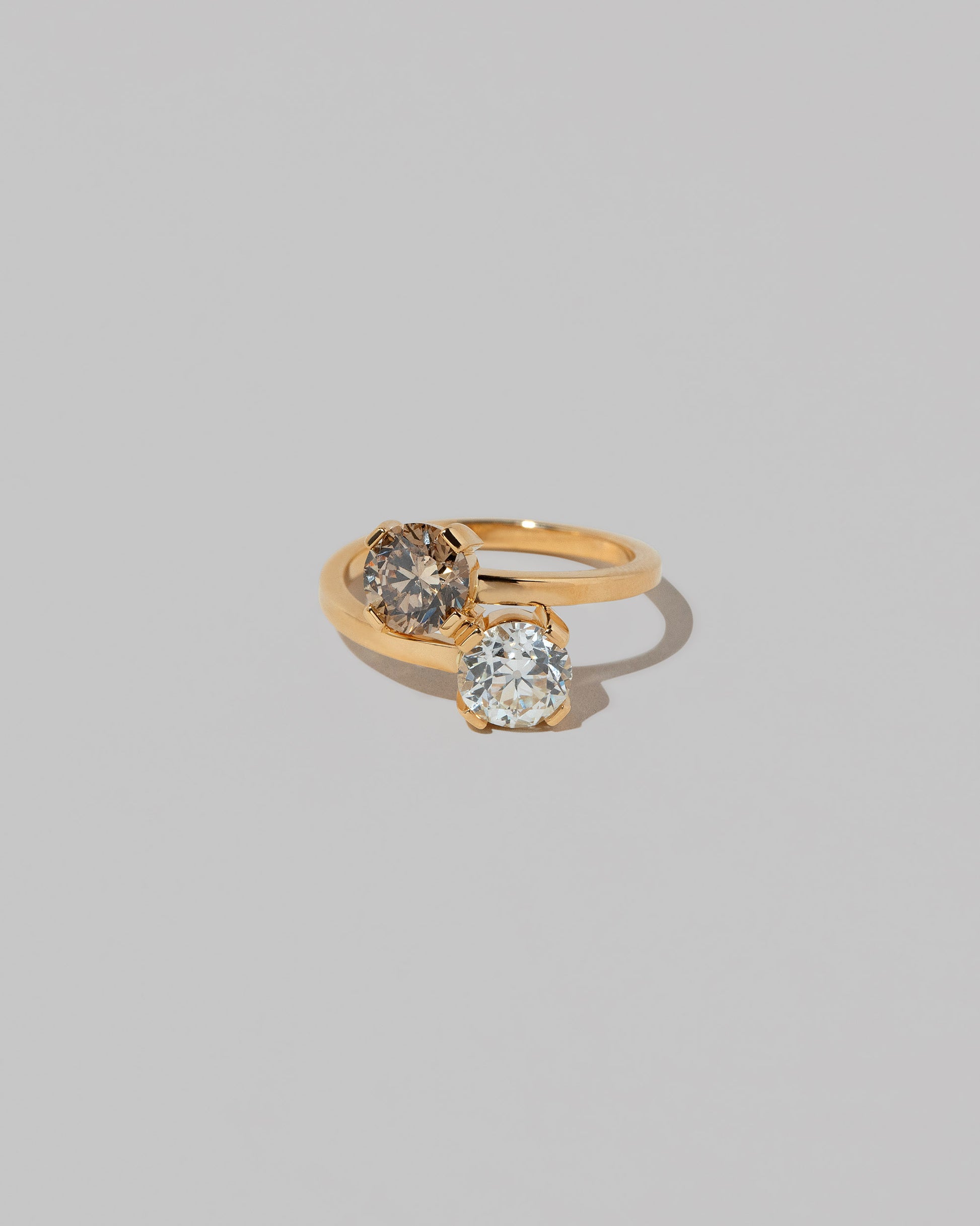 A past version of the Champagne & White Diamond Union Ring on light color background.