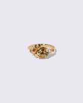 Bicolor Sapphire Vega Ring on light color background.