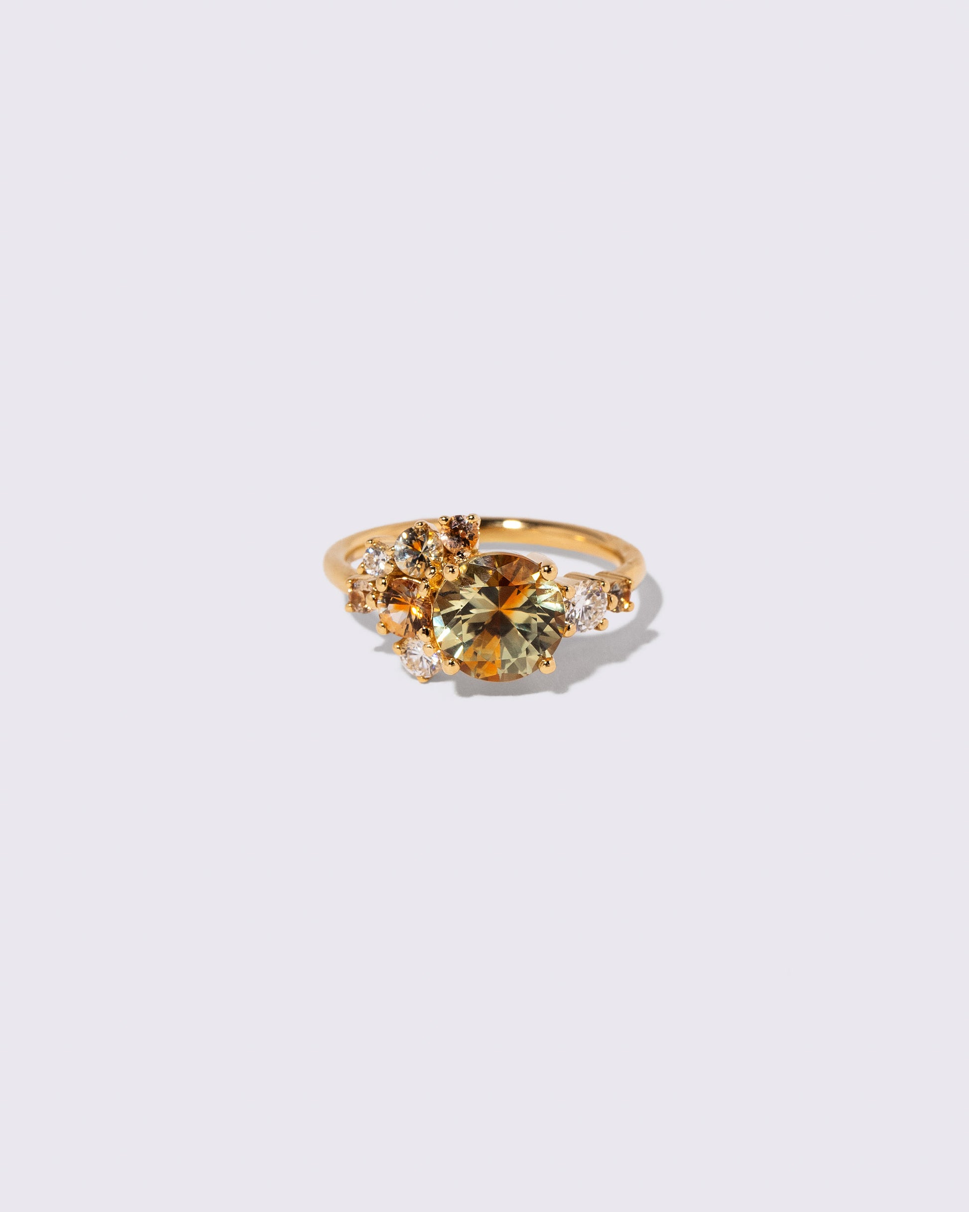 Bicolor Sapphire Vega Ring on light color background.