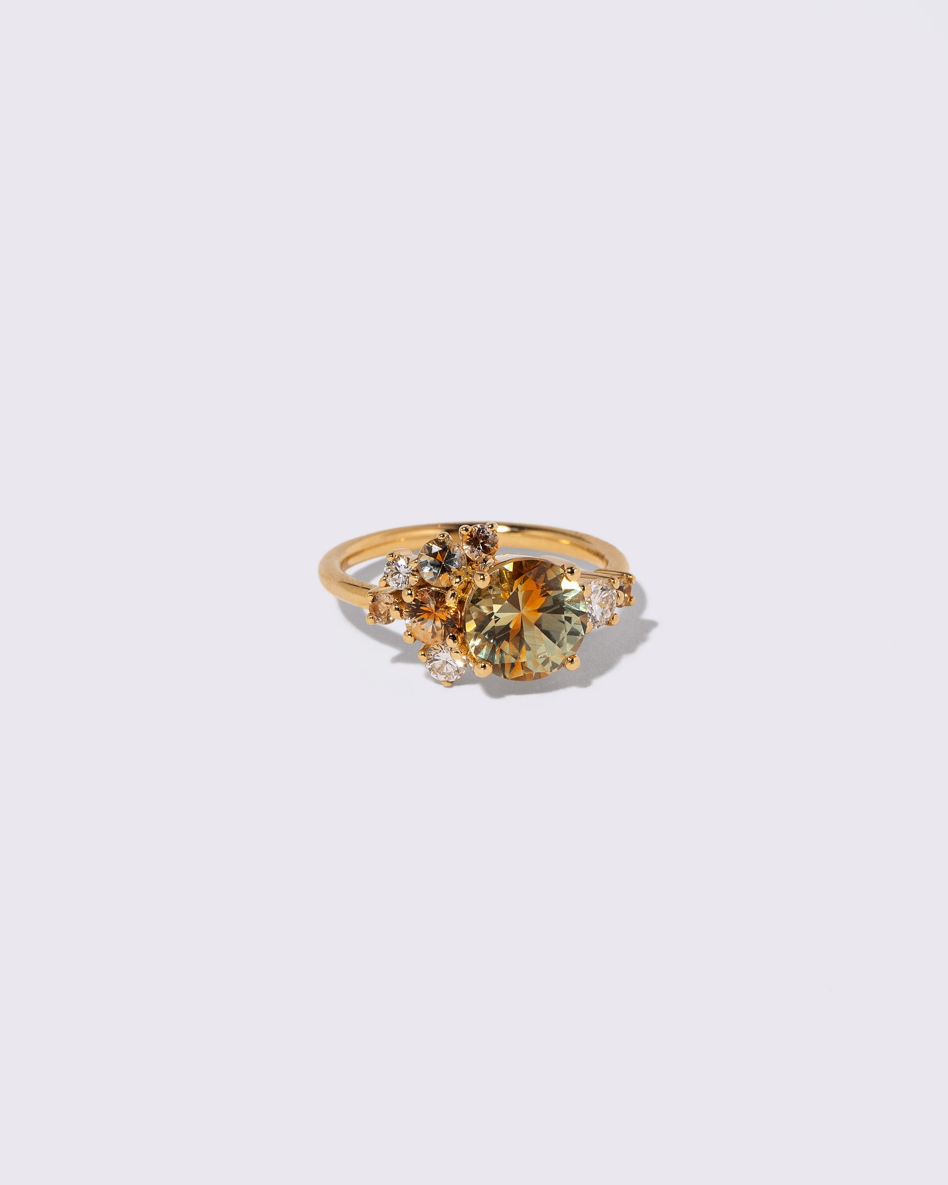 View from the side of the Bicolor Sapphire Vega Ring on light color background.