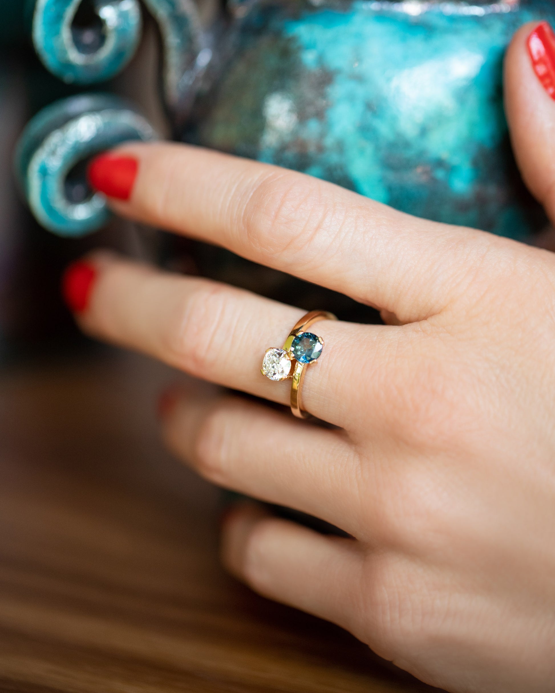 Sapphire & Diamond Union Ring on model.