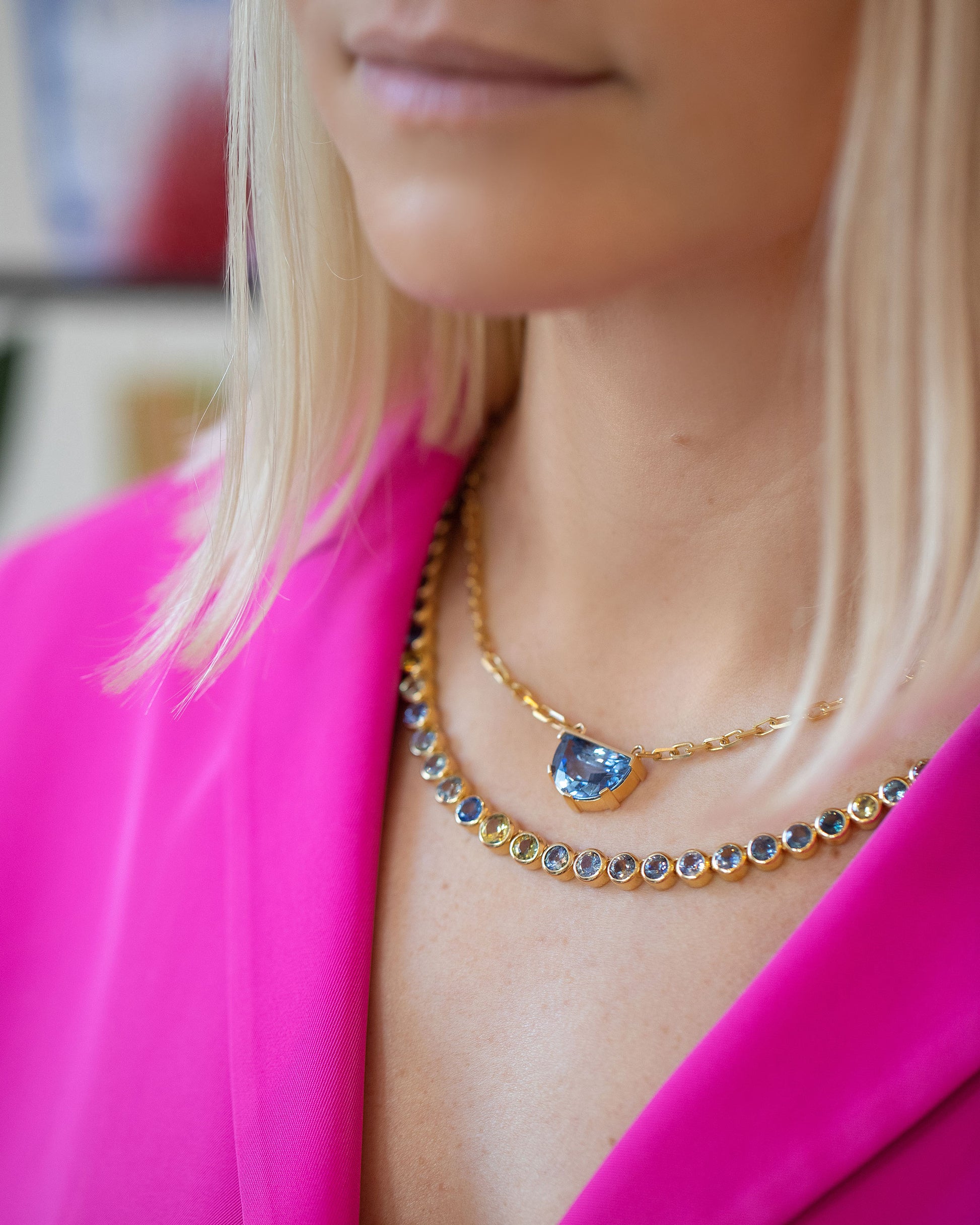 Reverence Necklace and Hologram Necklace on model.