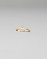 Gold Baguette Triangle Band on light color background.