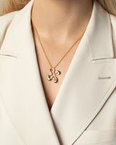 Styled image of model wearing the Wild Poppies Charm.