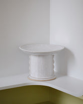 Morgan Peck White Pedestal Centerpiece on light color background.