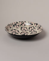 Morgan Levine Berry Pasta Bowl on light color background.