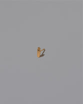 Hand Stud Earring Single on light color background.