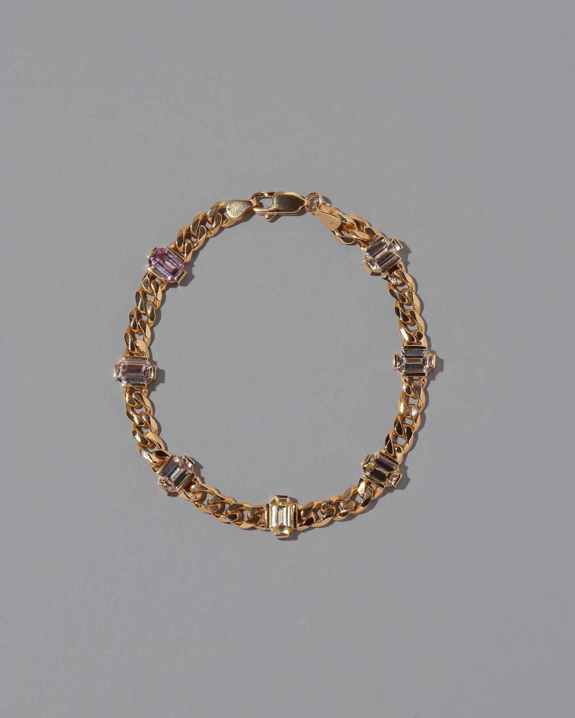 Envelop Bracelet on grey color background.