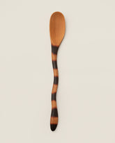 Jonathan's Spoons Cat Tail Spoon on light color background.