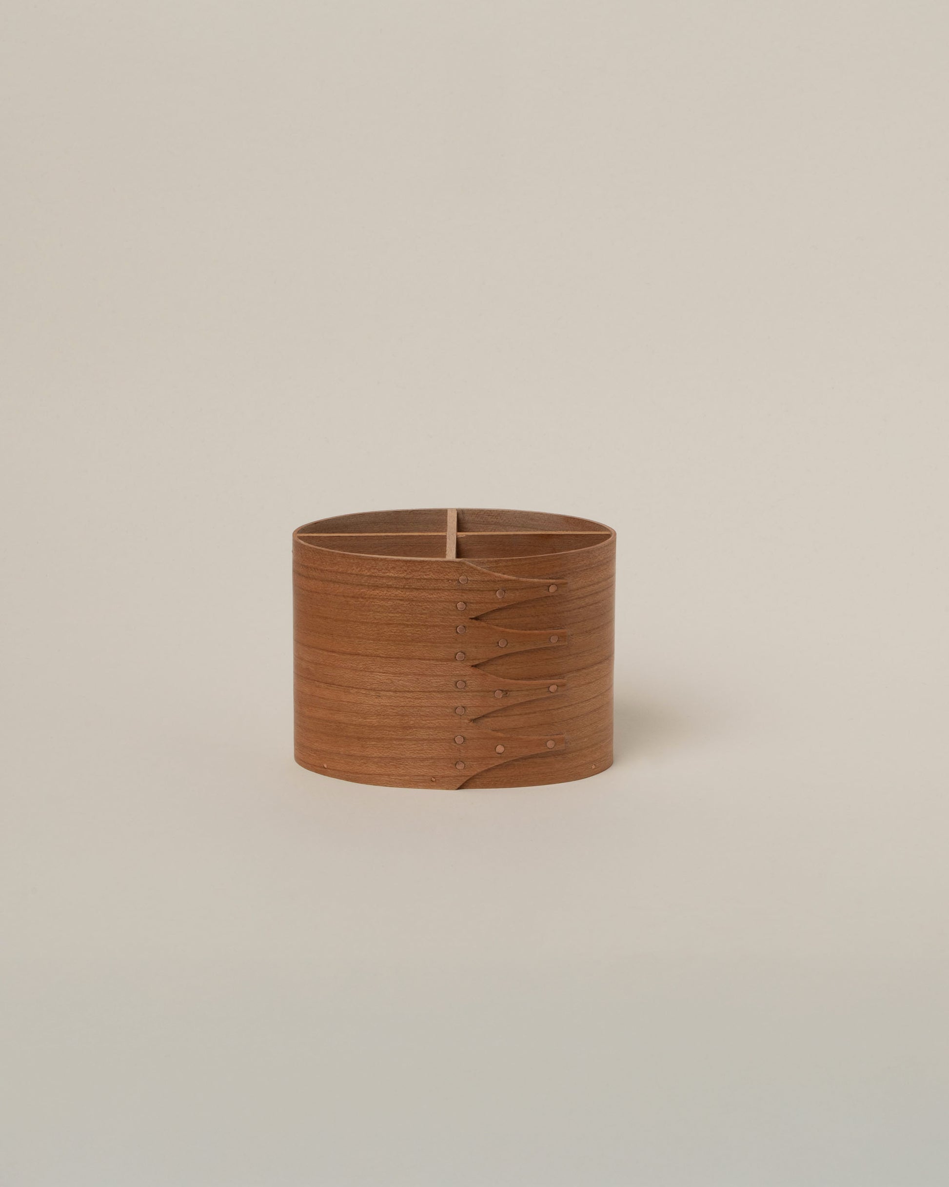 Rikke Falkow Cherry Wood Pen Pot on light color background.