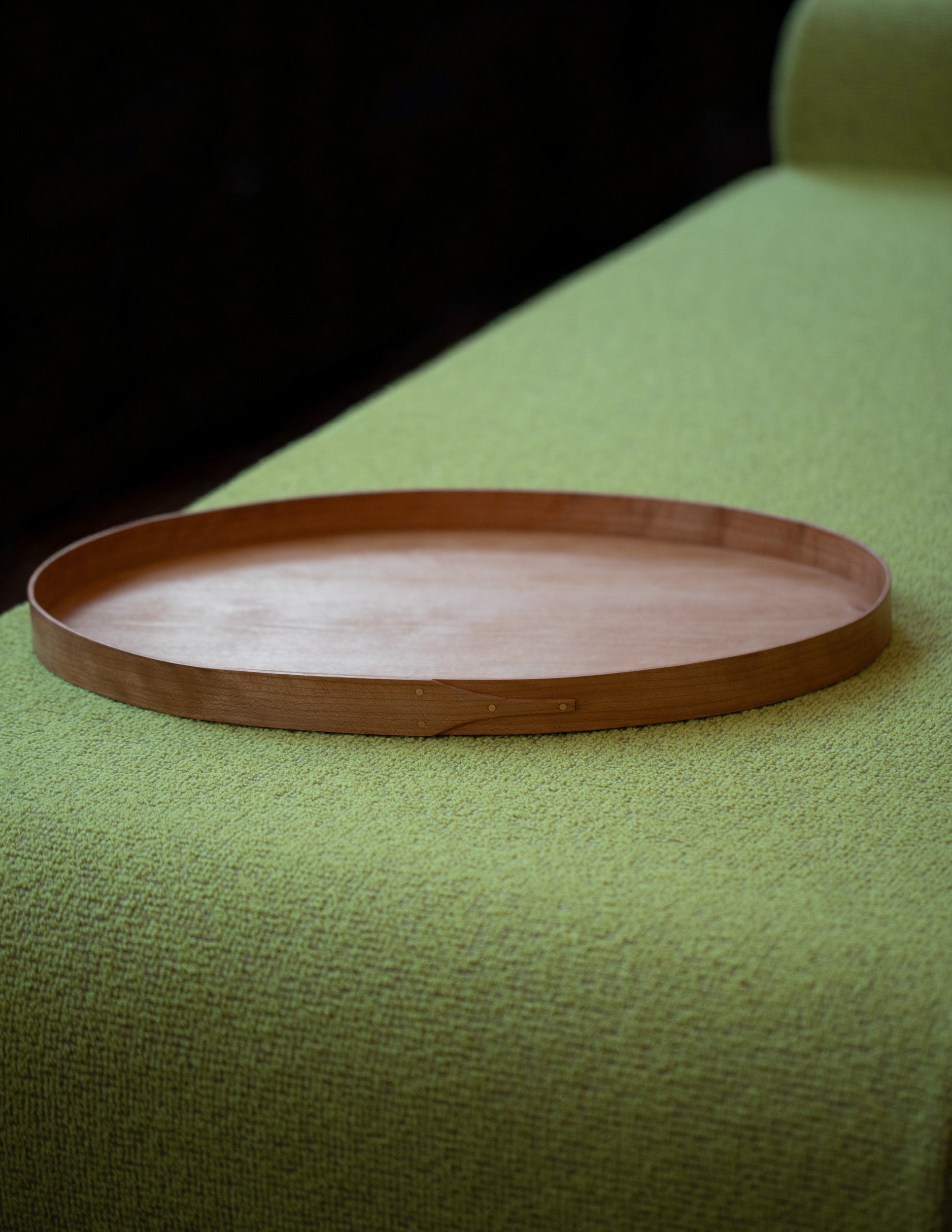 Rikke Falkow Large Cherry Wood Serving Tray on light color background.