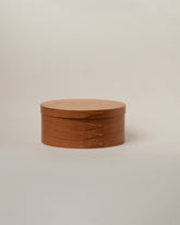 Rikke Falkow Large Cherry Wood Oval Box on light color background.