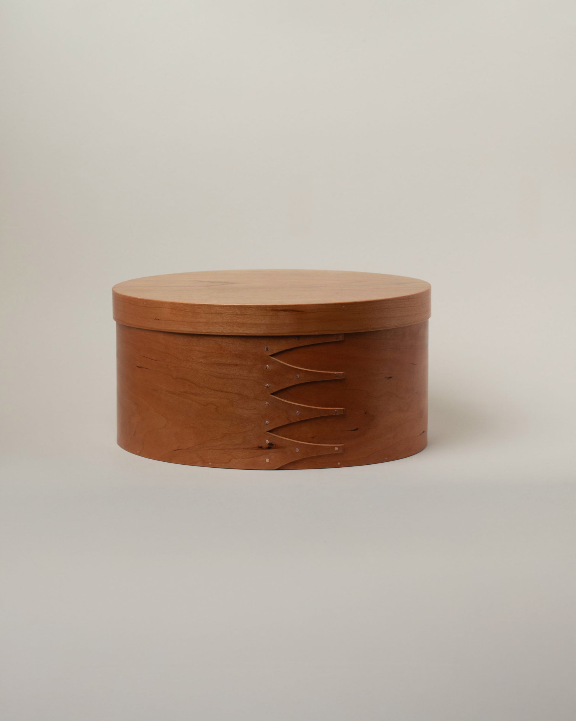 Rikke Falkow Extra Large Cherry Wood Oval Box on light color background.