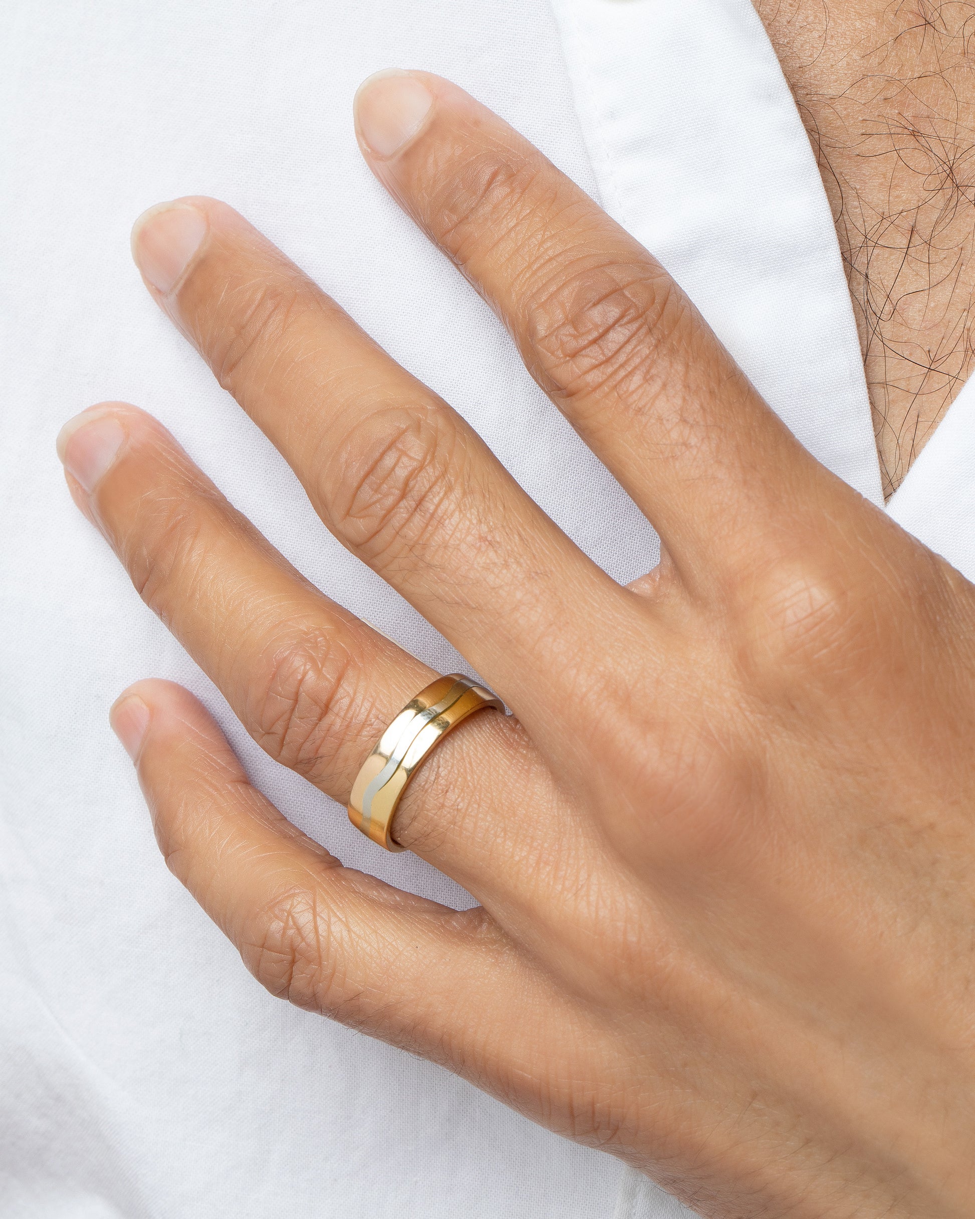 5mm Yellow 18K Outside and Platinum Inside Swimming Pool Bands on male model.