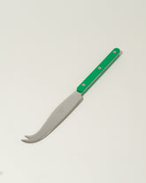 Sabre Paris Garden Green Cheese Knife on light color background.