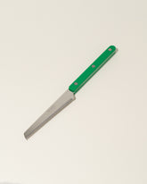 Sabre Paris Garden Green Tomato Knife on light color background.